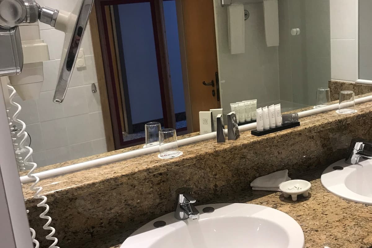 comfort single room | bathroom | free toiletries, hair dryer, bathrobes, slippers