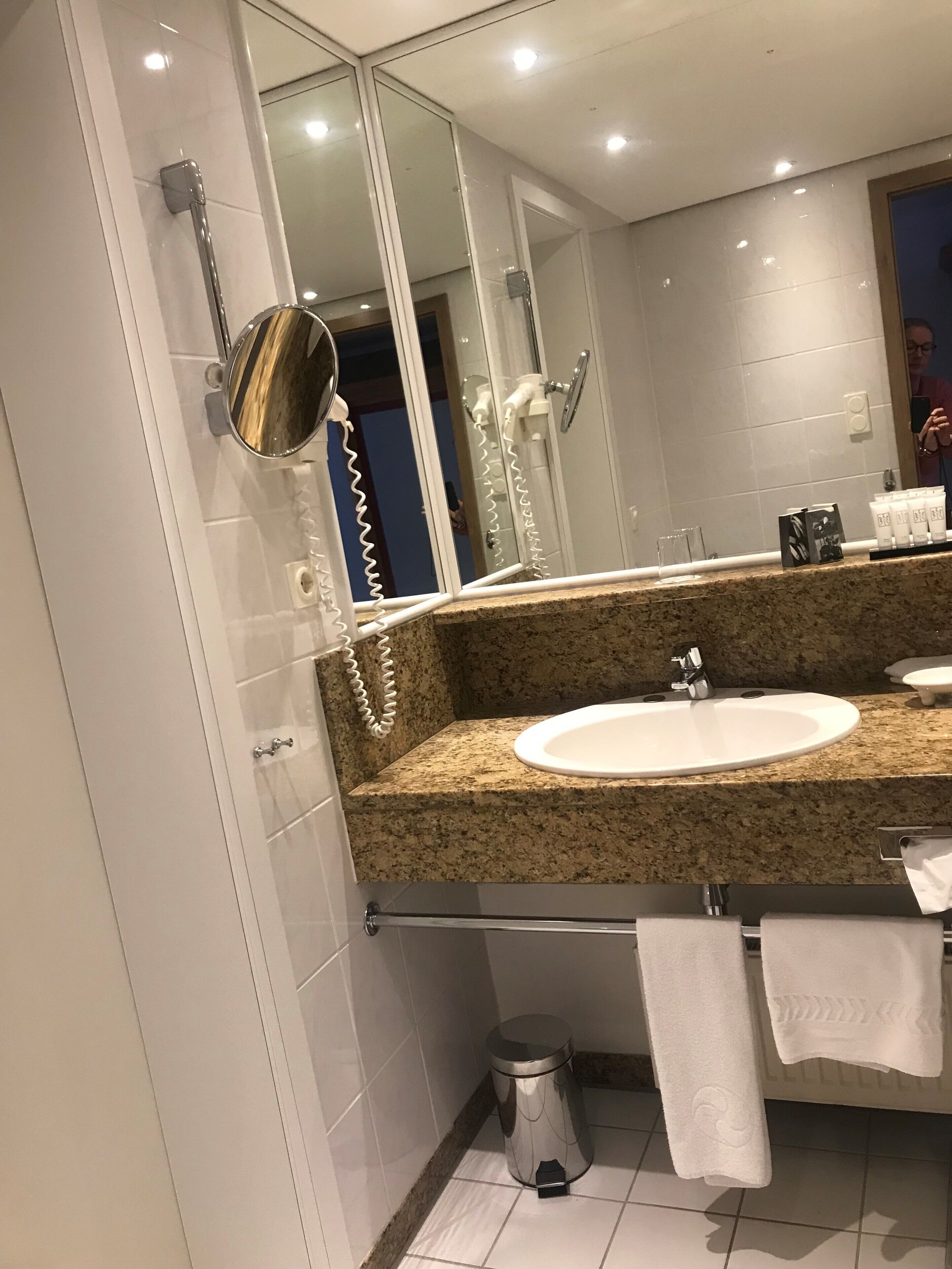 first class single room | bathroom | free toiletries, hair dryer, bathrobes, slippers