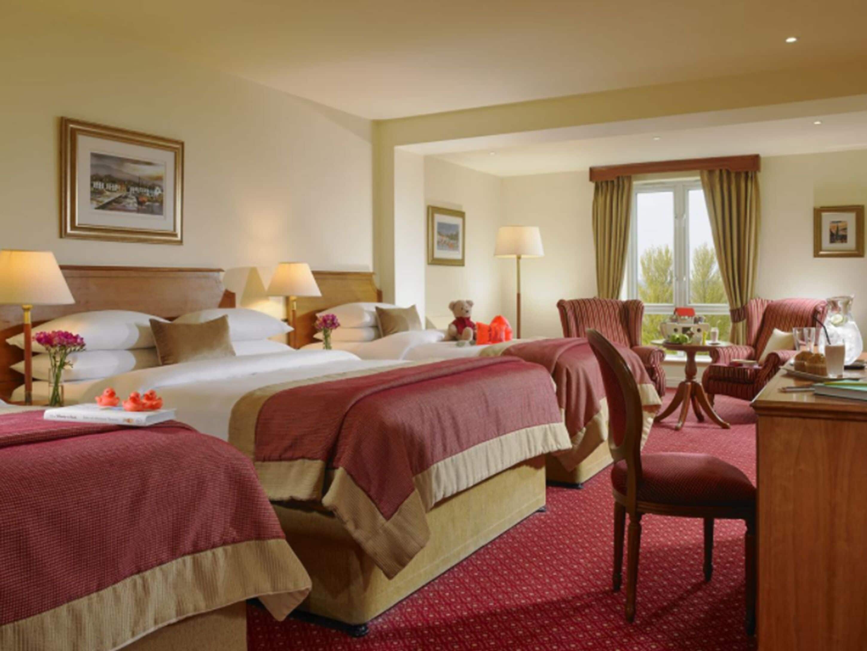 family room | premium bedding, in-room safe, desk, rollaway beds