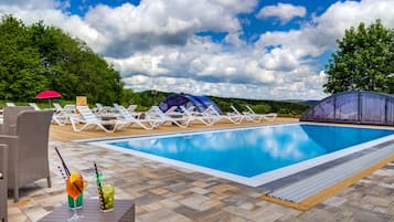 Seasonal outdoor pool, pool umbrellas, pool loungers