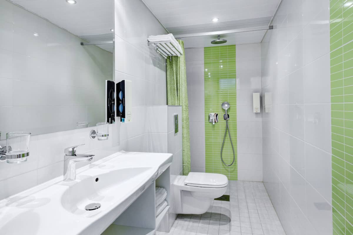 family suite, balcony, city view | bathroom | shower, rainfall showerhead, free toiletries, hair dryer