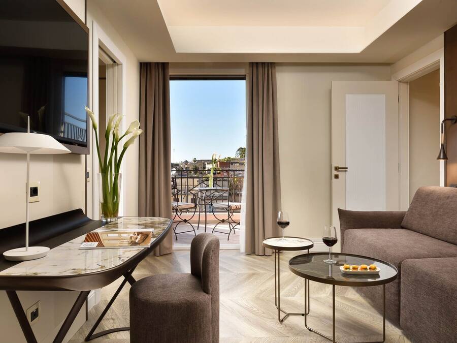 Suite with Jacuzzi Balcony Iconic View | Living area | 55-inch LCD TV with satellite channels