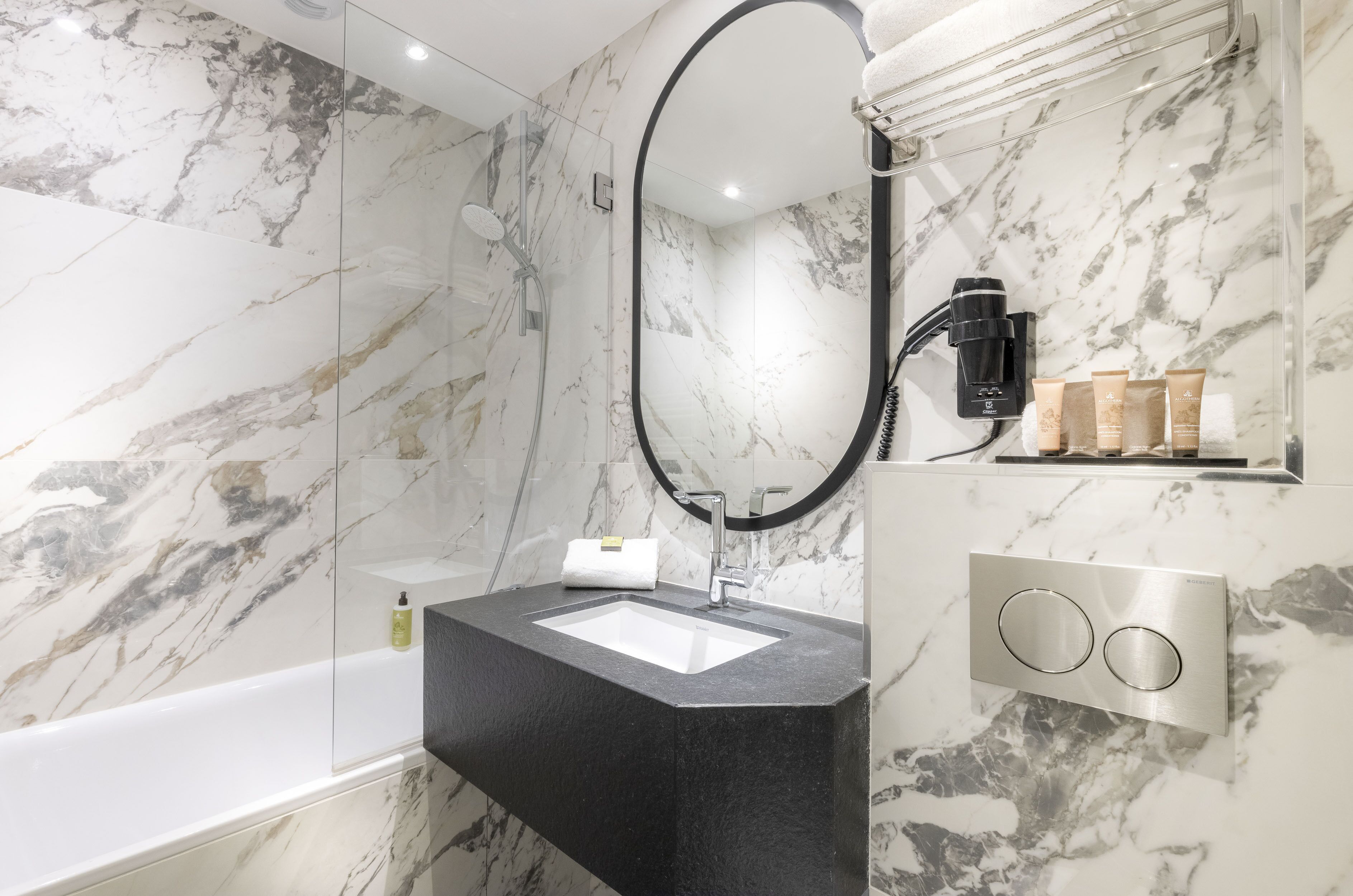 shower, free toiletries, hair dryer, towels