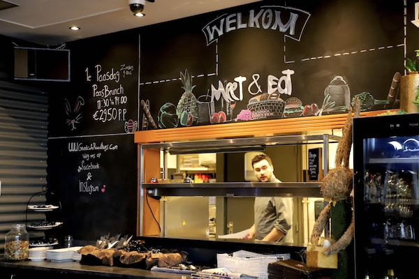 Breakfast, lunch, dinner served; local cuisine