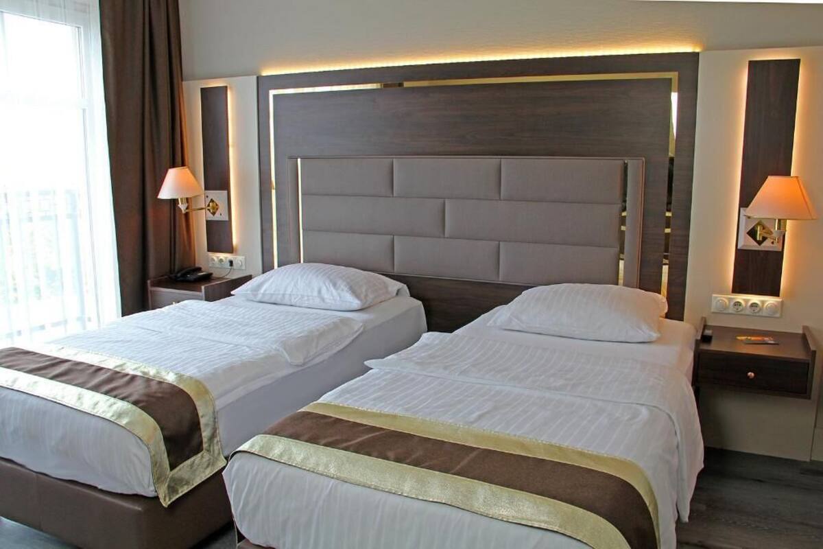 Literie hypoallergénique, couette en duvet, articles de minibar gratuits
