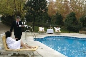 Outdoor pool, pool umbrellas, pool loungers