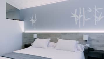 Suite junior | 1 dormitorio, caja fuerte, escritorio y cortinas opacas
