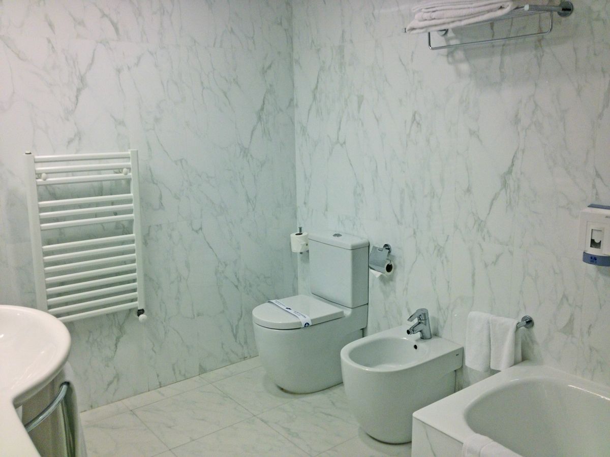 eco-friendly toiletries, hair dryer, bidet, towels