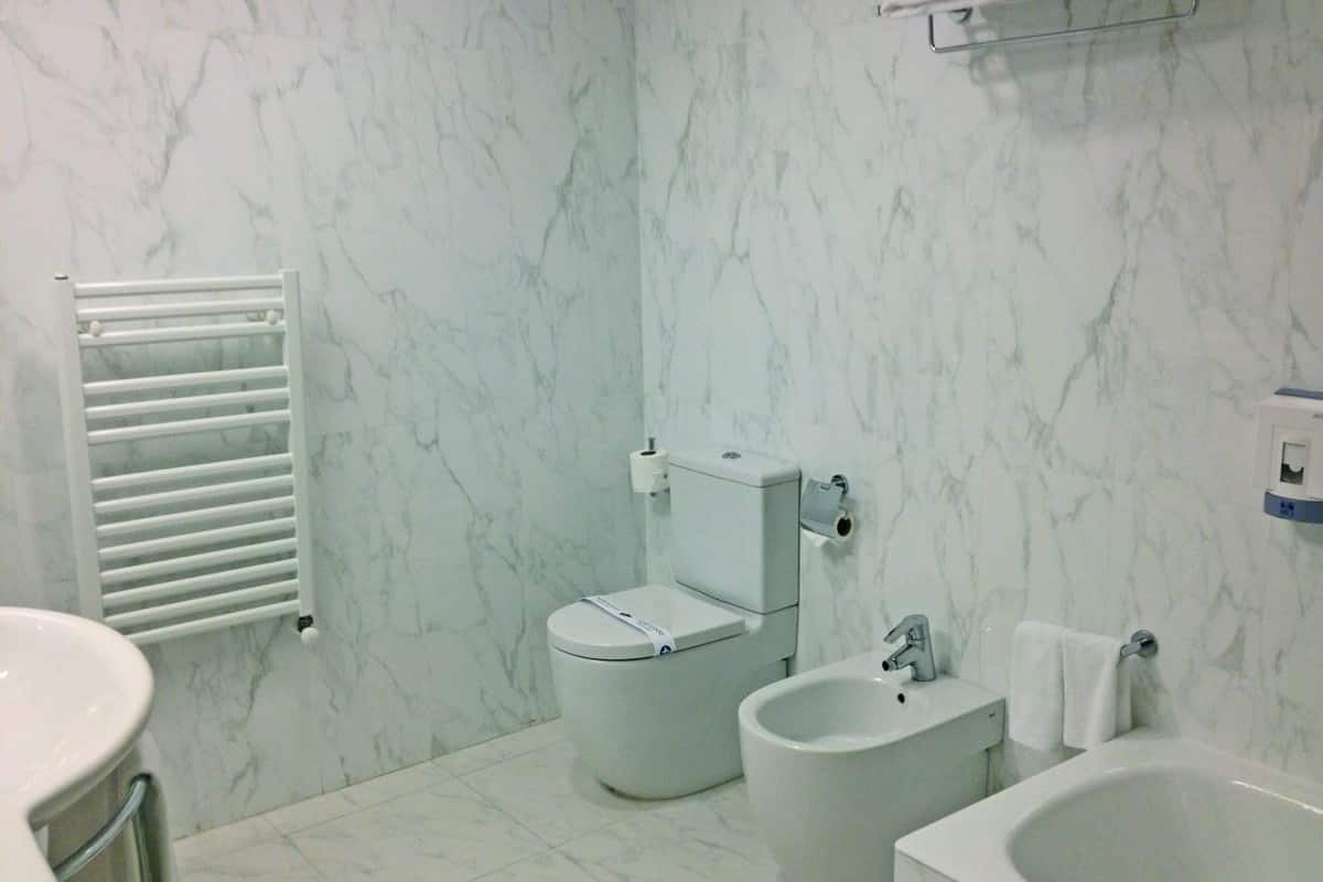 eco-friendly toiletries, hair dryer, bidet, towels