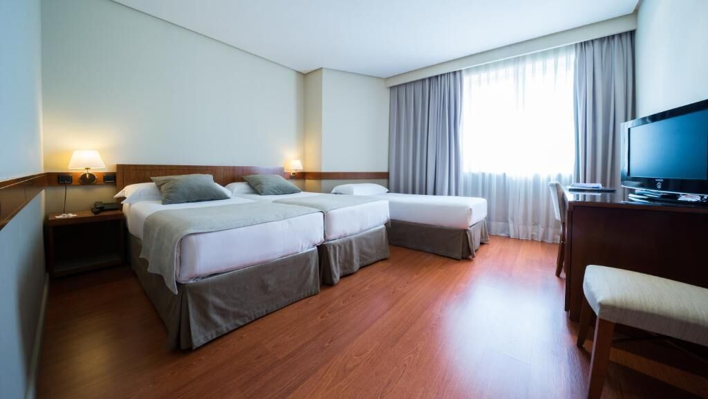 Tremannsrom – standard | Minibar, lydisolert, wi-fi (inkludert) og sengetøy