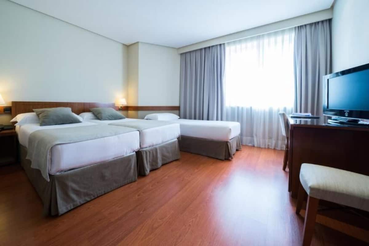 Tremannsrom – standard | Minibar, lydisolert, wi-fi (inkludert) og sengetøy