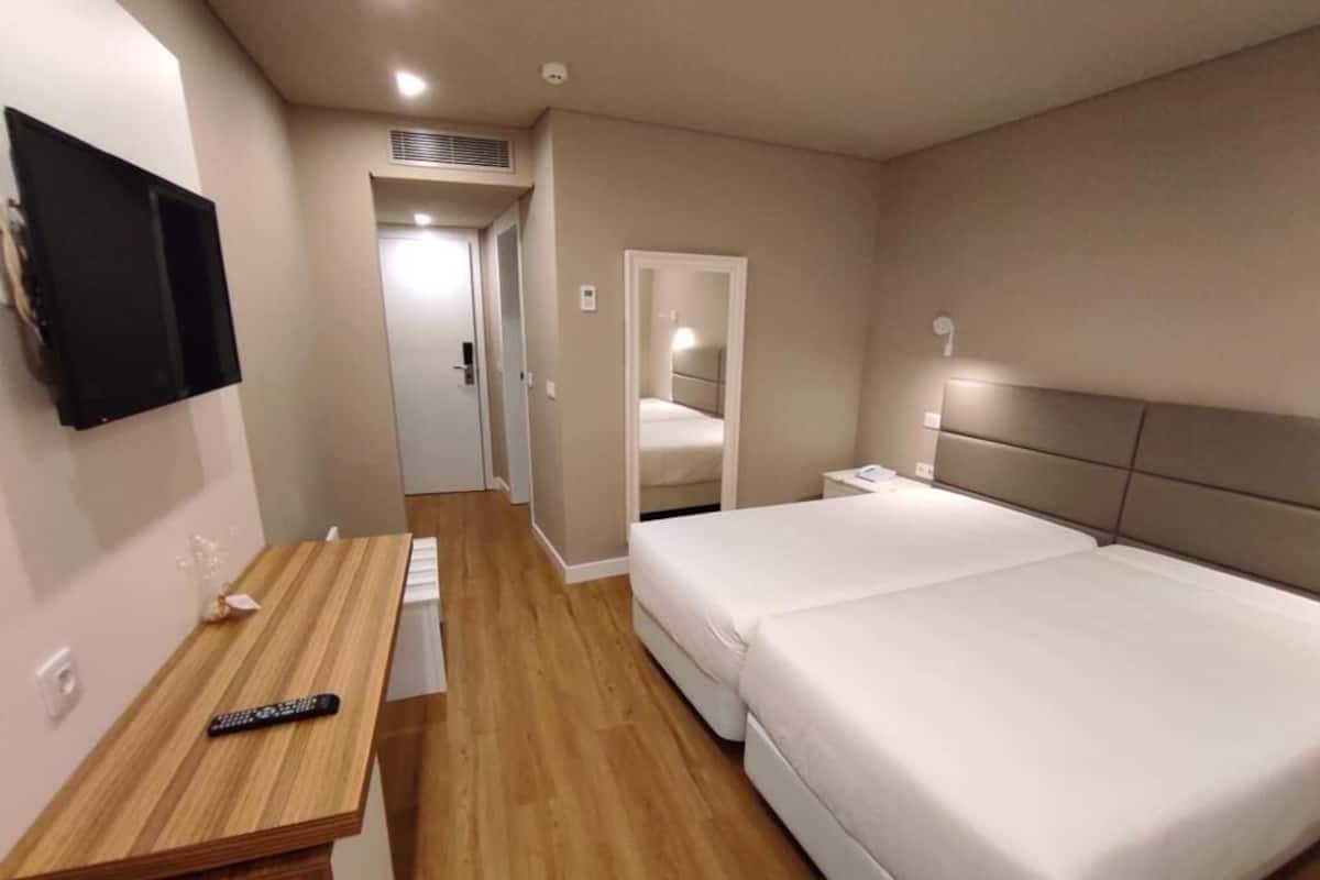 Desk, blackout curtains, free WiFi, bed sheets