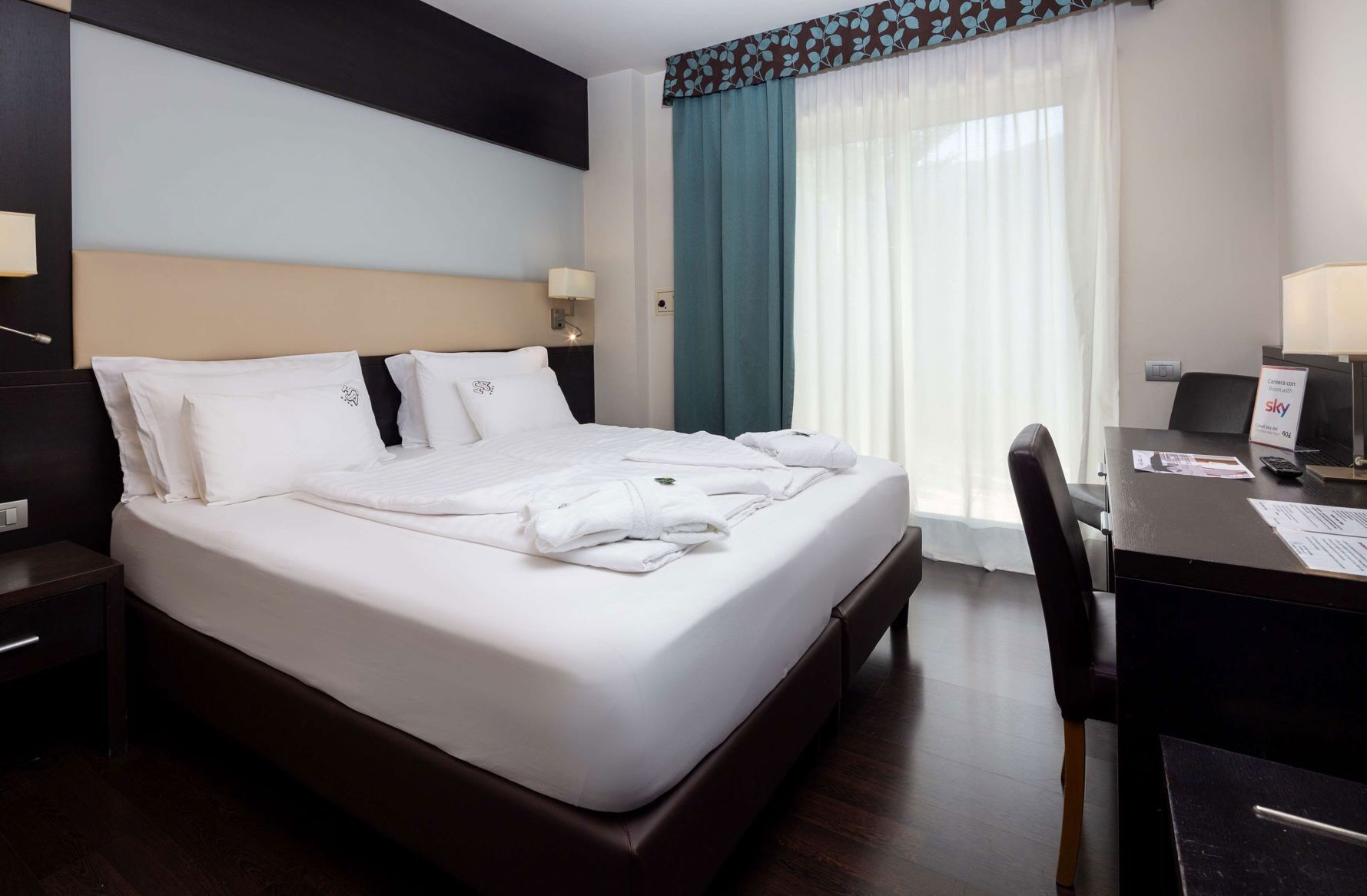 Premium bedding, down duvets, minibar, in-room safe