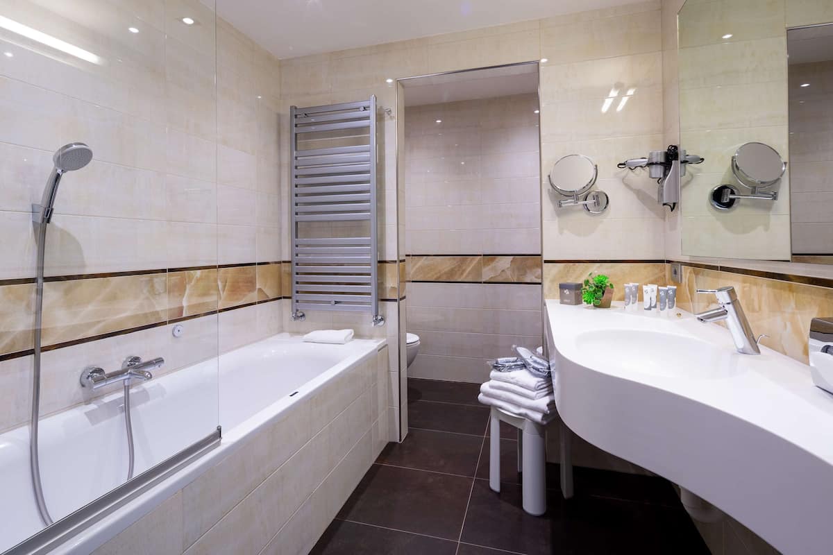 junior suite, 1 king bed (with sofabed) with access to the spa | bathroom | rainfall showerhead, free toiletries, hair dryer, bidet