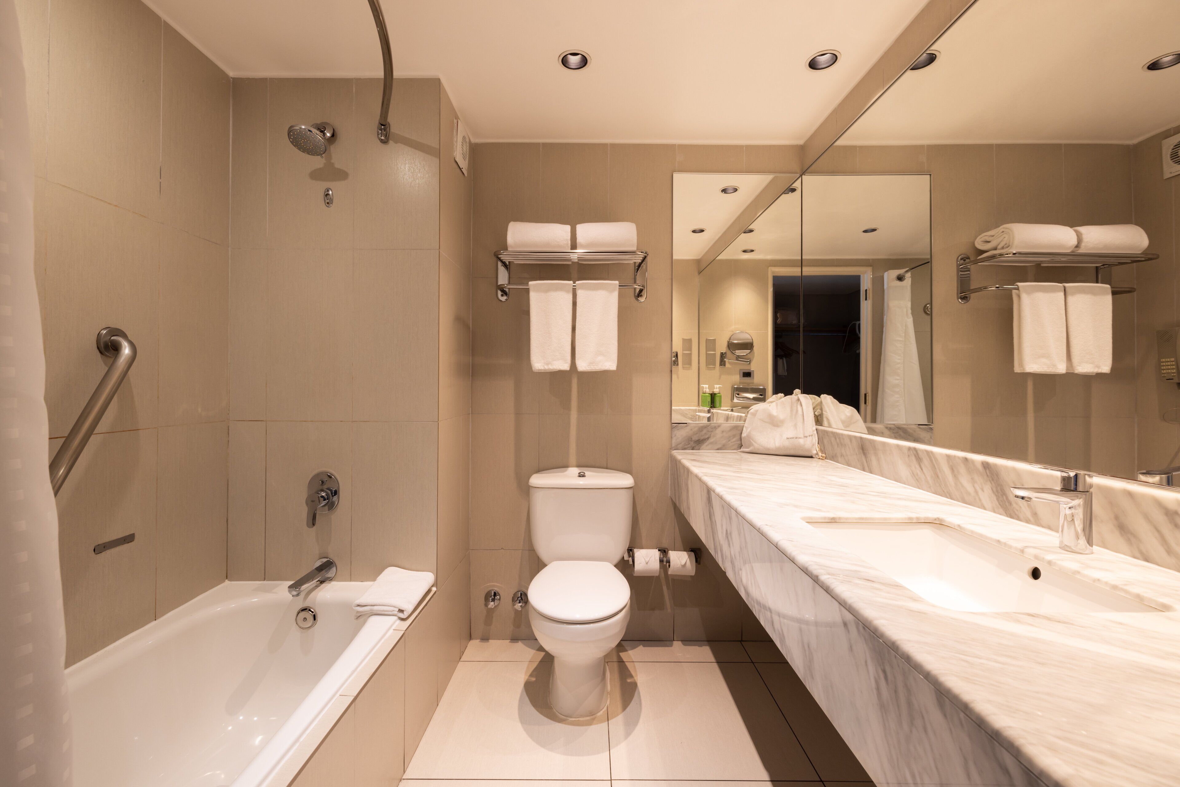 shower, rainfall showerhead, hair dryer, towels