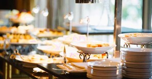 Indulge in a diverse selection of dishes at our well-organized buffet.