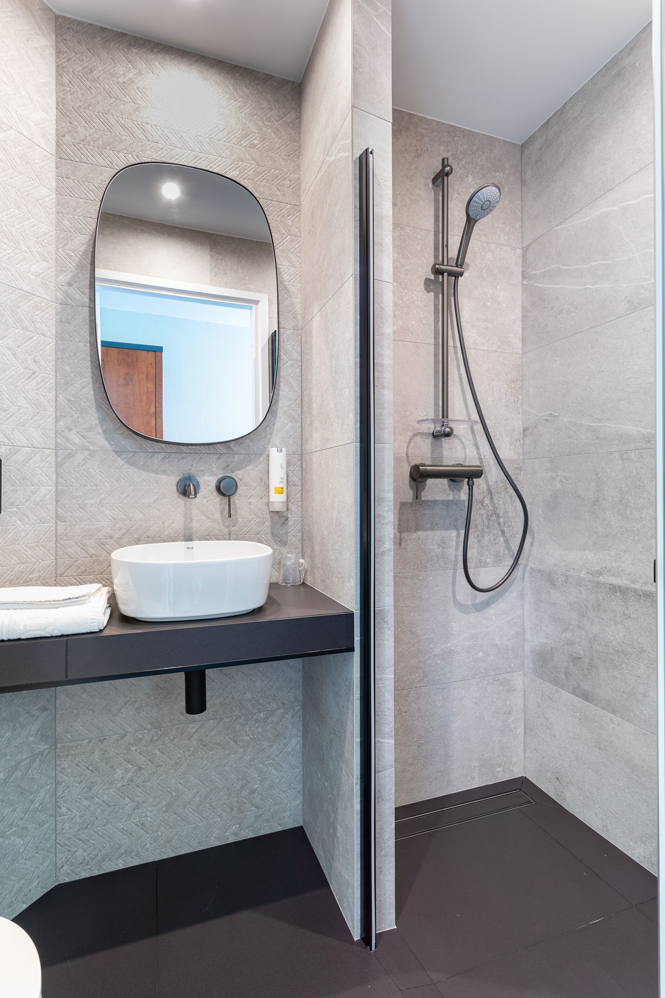 hair dryer, towels, soap, toilet paper