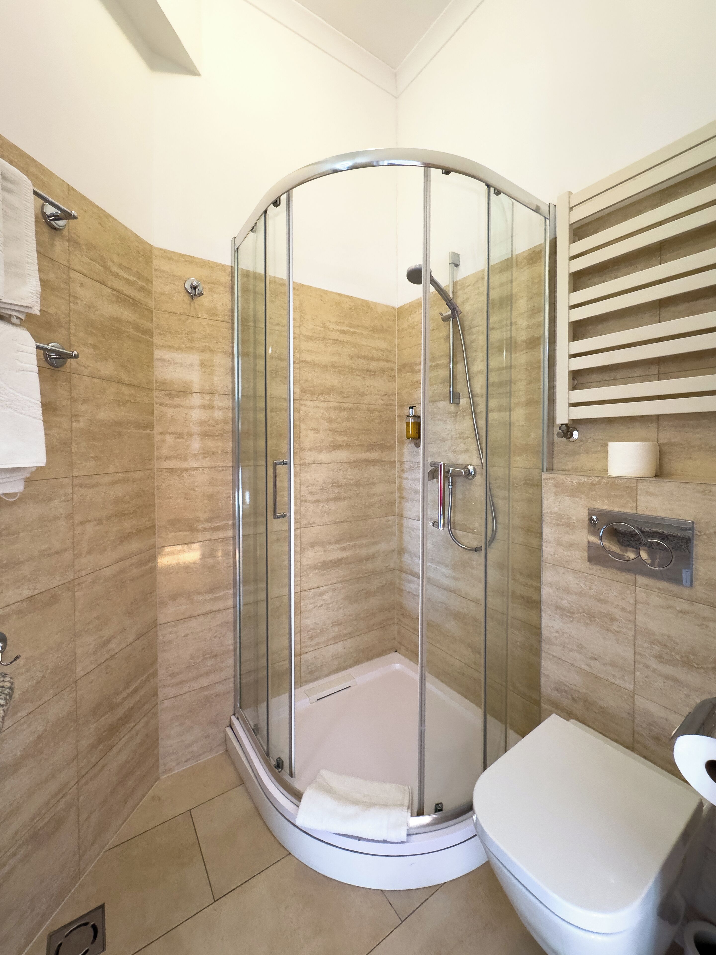 classic twin room | bathroom | hair dryer, towels, soap, shampoo