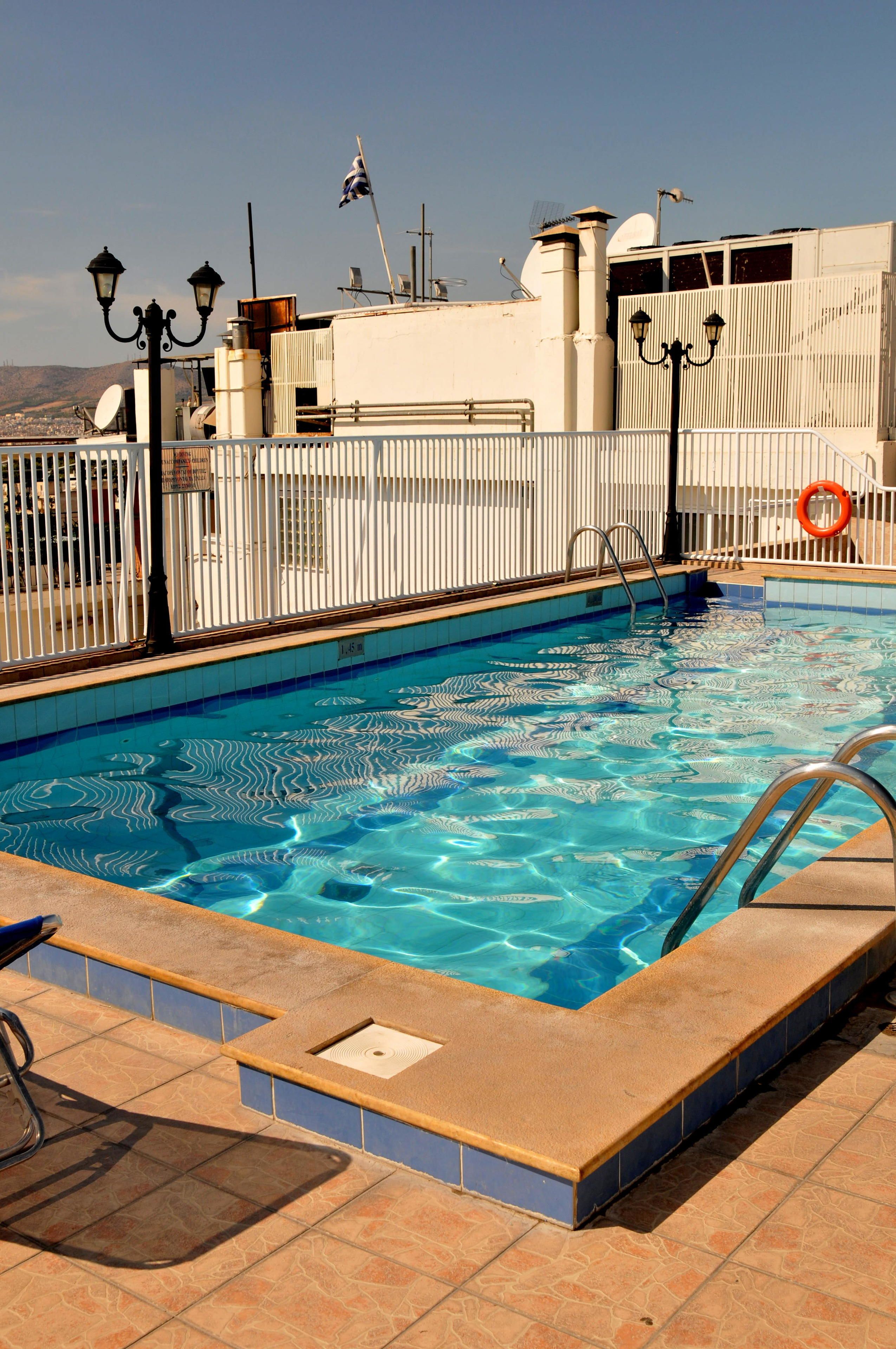 Outdoor pool, pool umbrellas, pool loungers