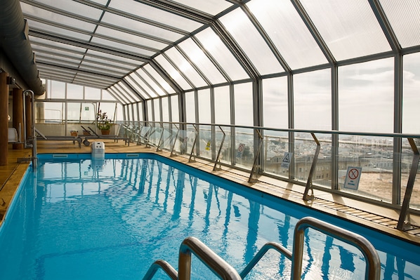 Indoor pool, seasonal outdoor pool, pool loungers