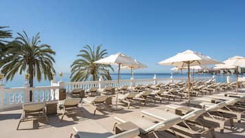 Indoor pool, outdoor pool, open 11:00 AM to 7:00 PM, pool umbrellas