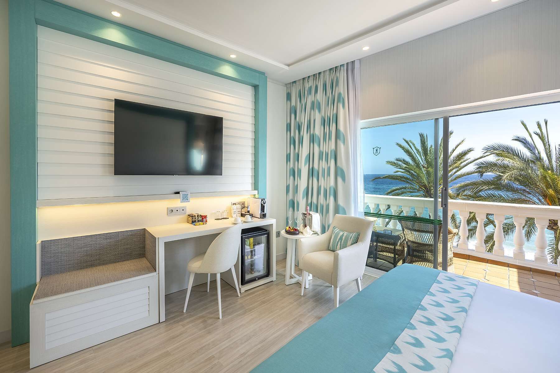 Premium bedding, down comforters, minibar, in-room safe