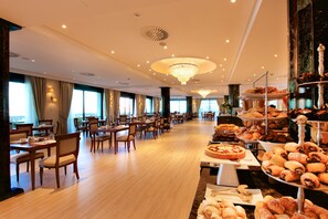 Daily buffet breakfast (EUR 26 per person)