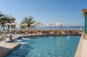 Indoor pool, outdoor pool, open 11:00 AM to 7:00 PM, pool umbrellas