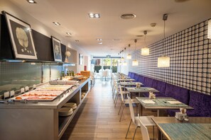 Daily buffet breakfast (EUR 18 per person)
