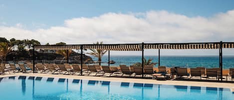 Indoor pool, 2 outdoor pools, open 10:00 AM to 6:00 PM, pool umbrellas