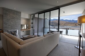 Flat-screen TV, iPod dock, books, pay movies