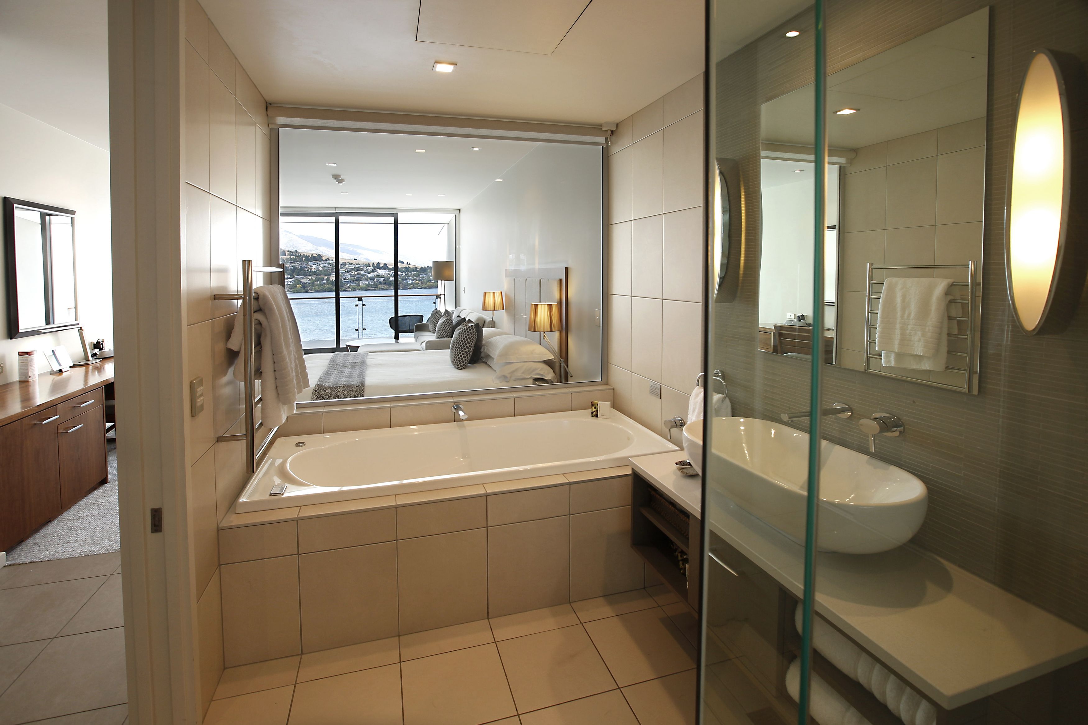 executive room, lake view | bathroom | shower, designer toiletries, hair dryer, bathrobes