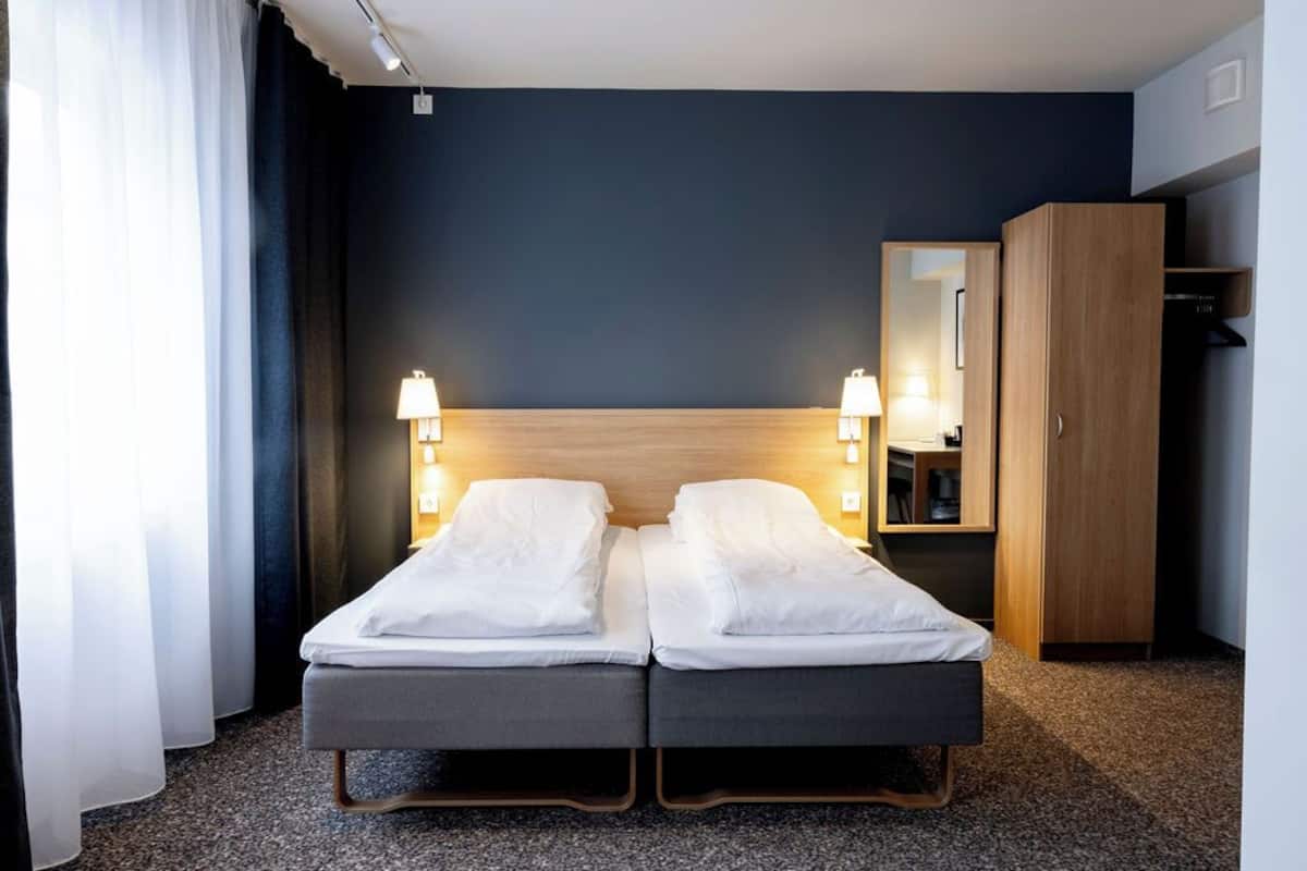 Desk, WiFi (free), alarm clocks, bed sheets