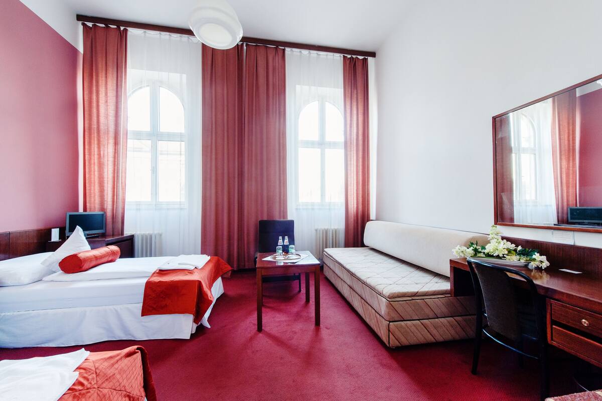 Triple Room | Minibar, in-room safe, desk, laptop workspace