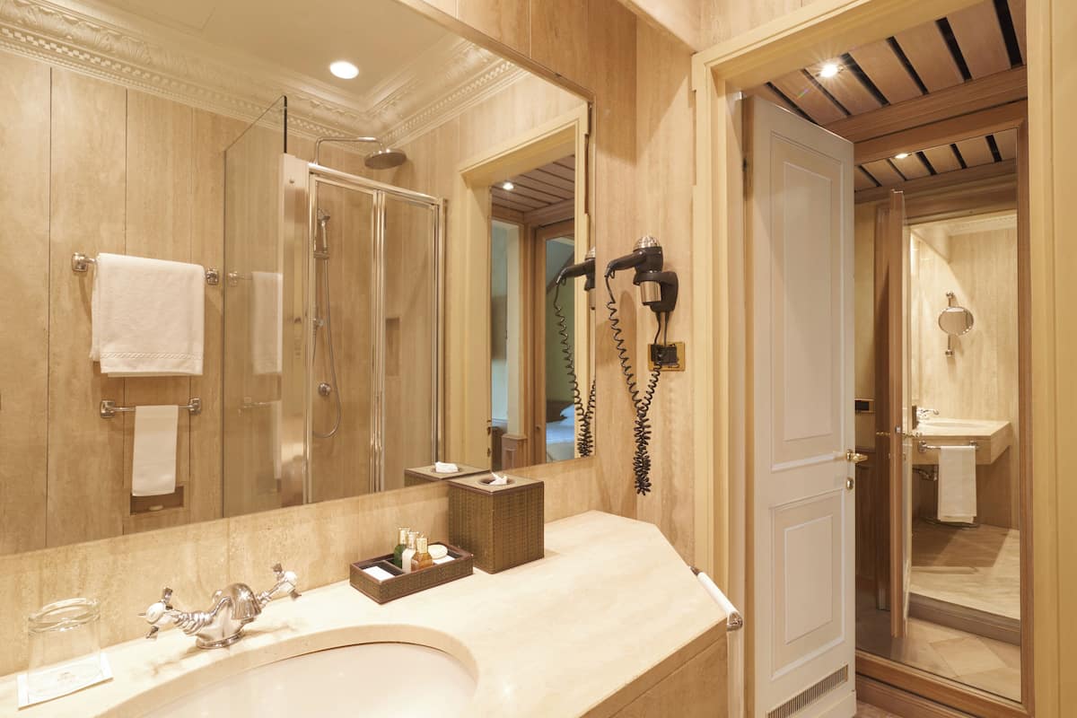 single room (french bed) | bathroom | designer toiletries, hair dryer, bidet, towels