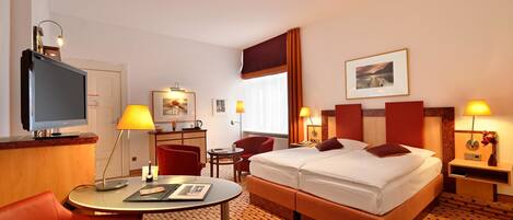 Ropa de cama de alta calidad y minibar
