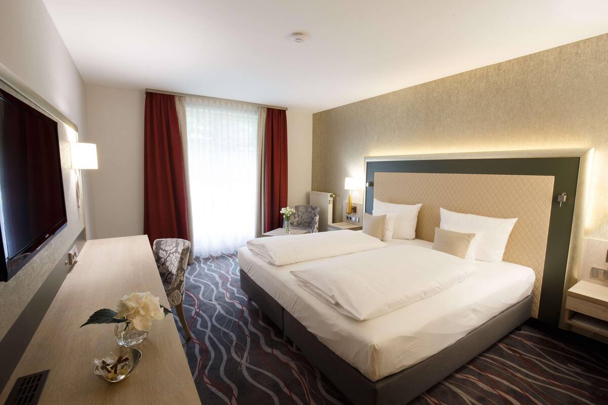 Literie hypoallergénique, minibar, coffres-forts dans les chambres