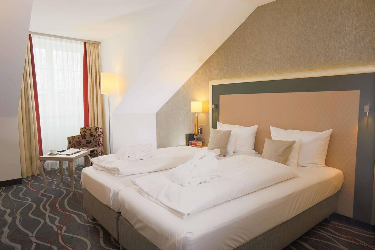 Literie hypoallergénique, minibar, coffres-forts dans les chambres
