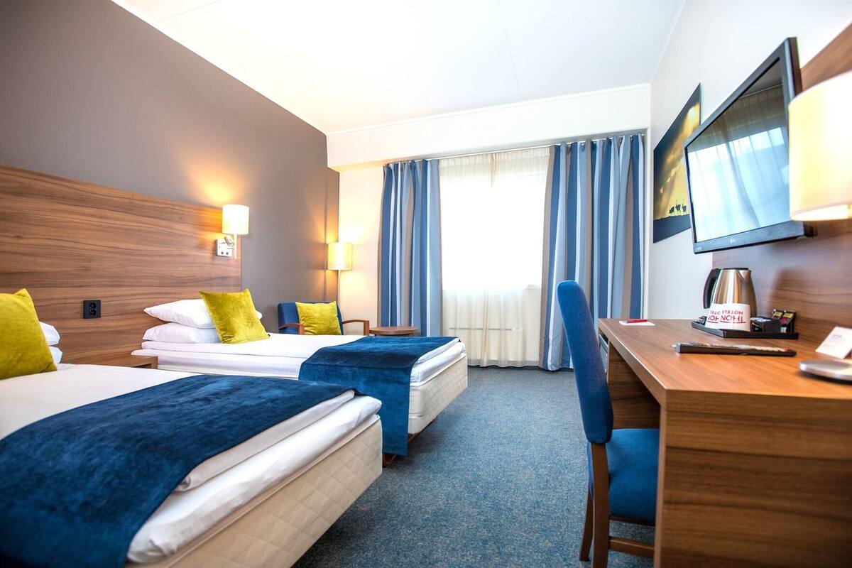 Hypo-allergenic bedding, pillow-top beds, desk, blackout curtains