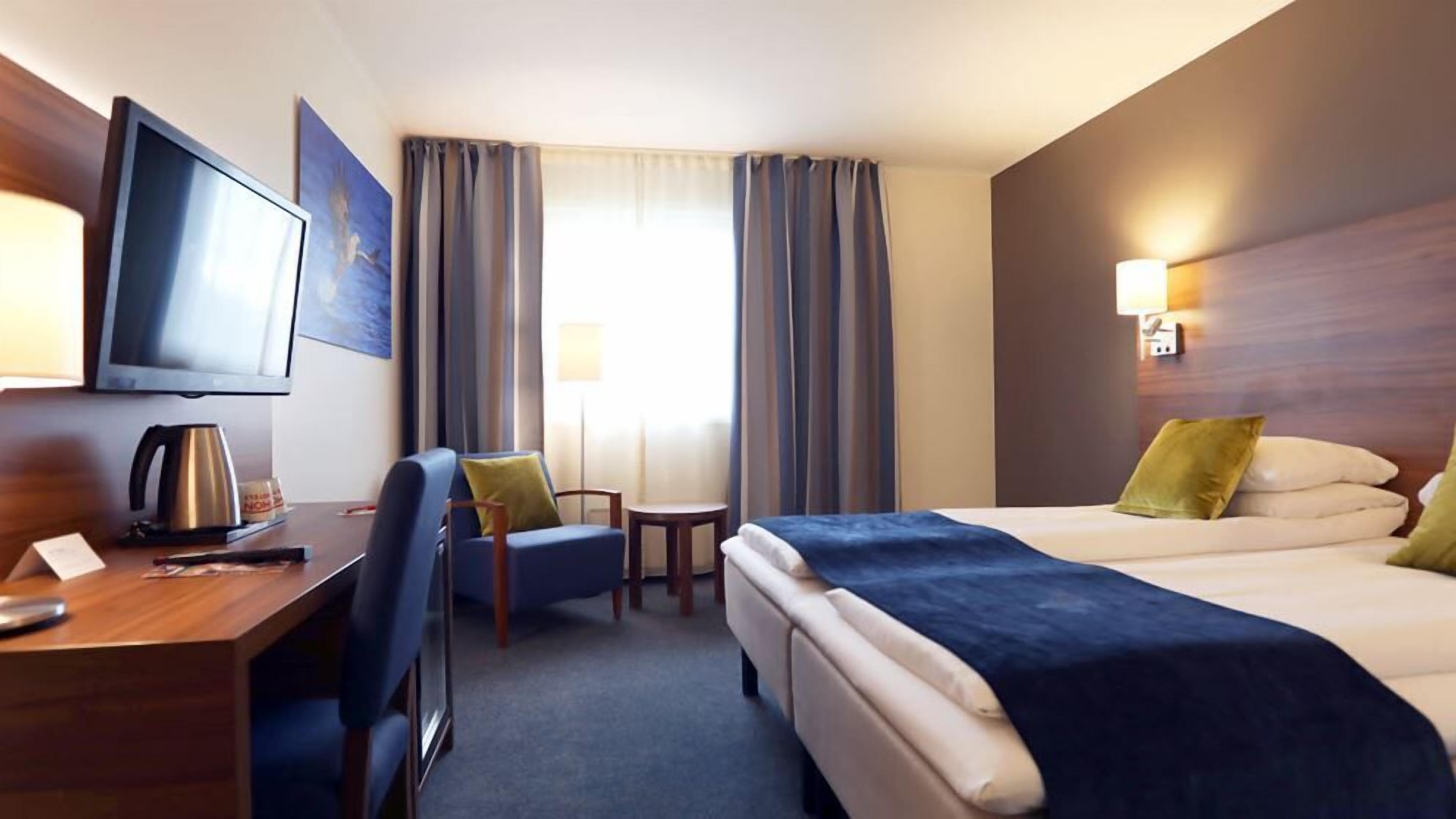 Hypoallergeen beddengoed, pillowtop-bedden, een bureau