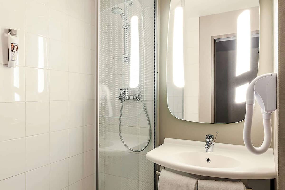 premium bedding, desk, laptop workspace, blackout curtains