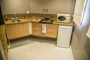 Microwave, stovetop, cookware/dishes/utensils