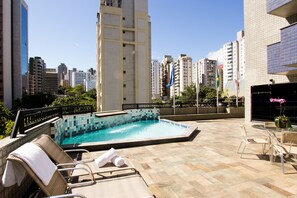 Outdoor pool, pool umbrellas, sun loungers