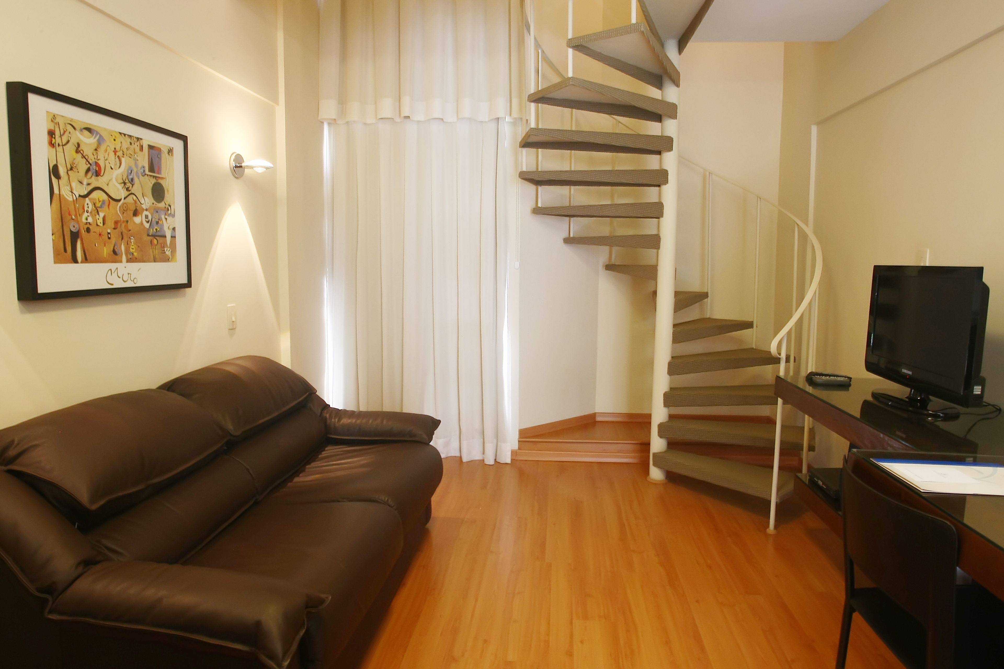 deluxe triple room, multiple beds | minibar, in-room safe, desk, blackout curtains