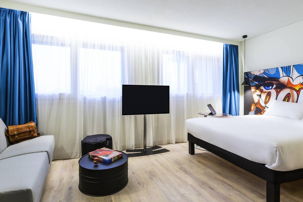 Suite – standard, flere senger | Skrivebord, blendingsgardiner, lydisolert og strykejern/-brett