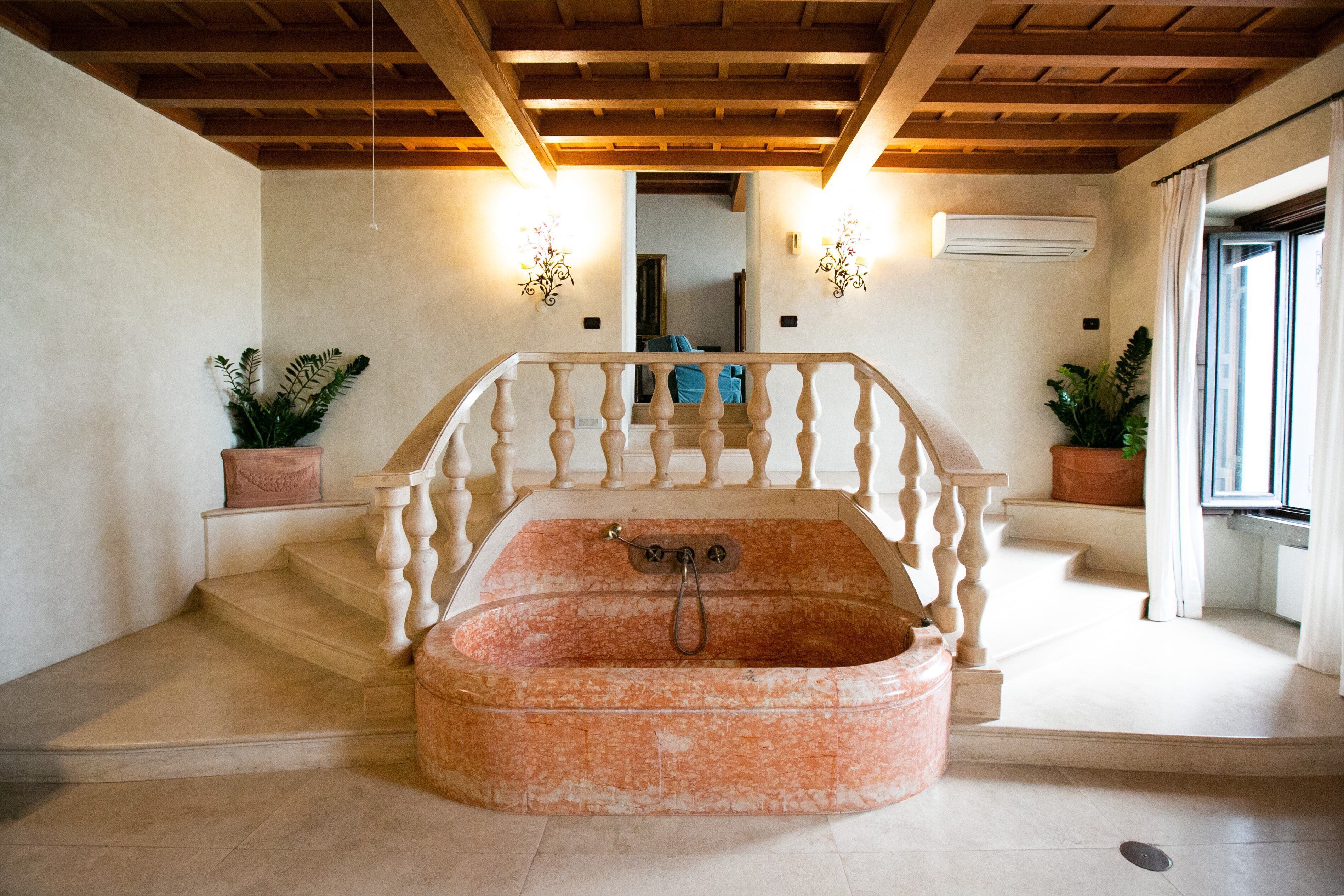 designer toiletries, hair dryer, bathrobes, slippers