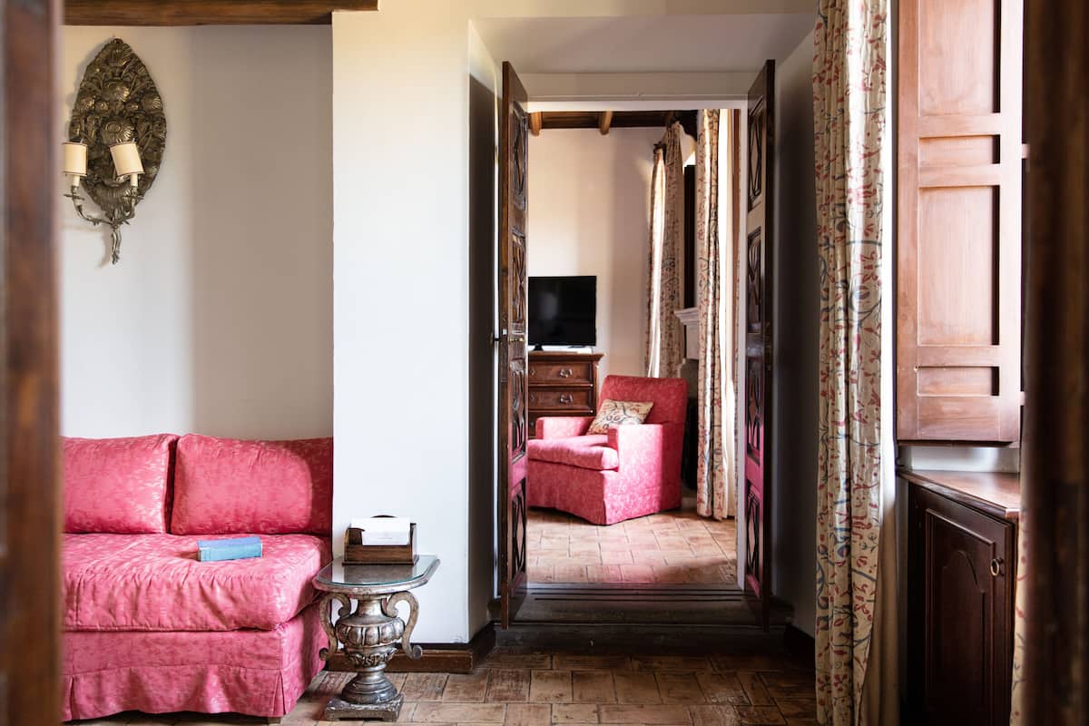 The Red Suite | Premium bedding, minibar, in-room safe, individually decorated