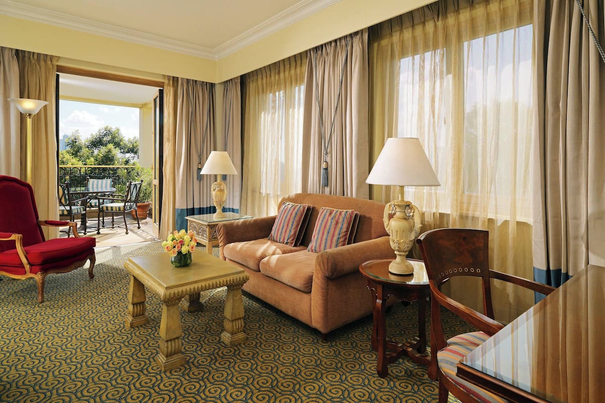 Executive Suite, 1 King Bed, Smoking, Balcony | Premium bedding, minibar, in-room safe, desk
