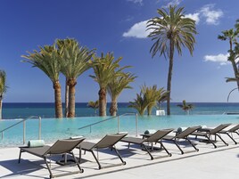 3 outdoor pools, pool umbrellas, sun loungers