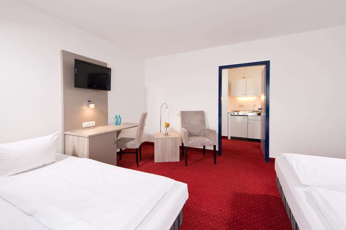 Studio (Triple Room) | Minibar, desk, laptop workspace, cots/infant beds